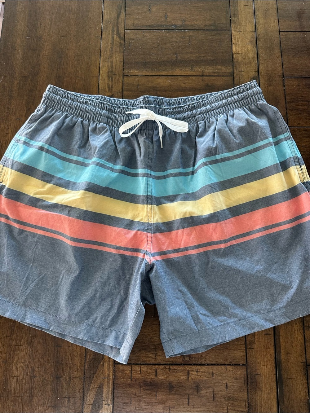 chubbies Blue Swim Trunks with Aqua Yellow and Coral Stripes 5.5”